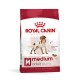 Sac de nourriture pour chien Royal Canin Medium Adult, présentant une illustration de chien, avec un texte mettant en avant "Soutien à la masse musculaire" et "Chiens de plus de 12 mois".