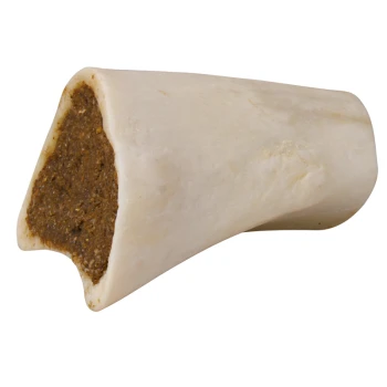 Ein großer, hohler Hundeknochen gefüllt mit einer braunen, strukturierten Mischung, zeigt ein natürliches, weißes Äußeres.