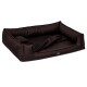 Braunes Haustierbett mit erhöhten Rändern und einem weichen Inneren, ausgestattet mit einem kleinen Kissen und einem Logosticker auf der Vorderseite.