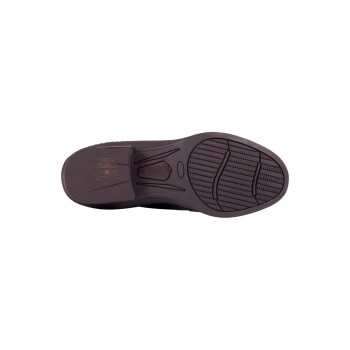 Bild der Sohle eines braunen Schuhs, mit einem strukturierten Griffmuster und dem Markennamen "Salthouse" auf der Seite geprägt.