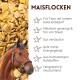 Nahaufnahme von gelbem und weißem getrocknetem Cornflakes-Tierfutter aus einem Online-Tiergeschäft.