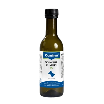 Canina 'Schwarzkümmel Öl' Flasche — Schwarzkümmelöl für Hunde, grüne Glasflasche mit weißem Etikett und blauem Hundelogo.