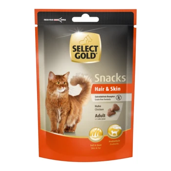 Verpackung von Select Gold Hair & Skin Katzensnacks mit einer flauschigen orangefarbenen Katze, mit Text, der die getreidefreie Formel und den Hühnergeschmack hervorhebt.