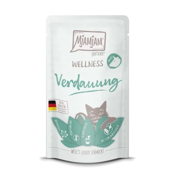 Mjamjam Wellness kattenvoer zakje met een speelse kat illustratie, gelabeld 'Verdauung' voor spijsverteringsondersteuning, met een Duits kwaliteitszegel.
