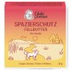 Yuki kümmert sich um Fellbutter, eine pfotenförmige Tierbutter aus Kokosnuss, schwarzem Kreuzkümmel, Neem- und Teebaumölen zum Schutz des Fells.