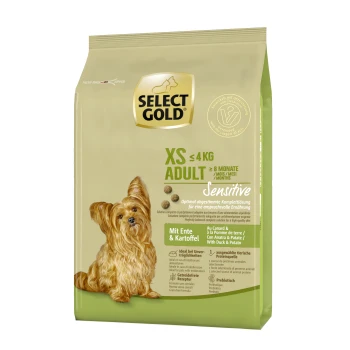 Dog food bag labeled "SELECT GOLD XS ADULT" for dogs up to 4 kg, featuring a Yorkshire Terrier and "Sensitive" duck and potato ingredients.