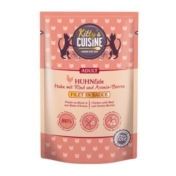 Pochette de nourriture pour chat étiquetée "Cuisine de Kitty" présentant "Huhnliebe" (Amour de Poulet) avec du bœuf et des baies d'aronia, contenant 86 % de viande.