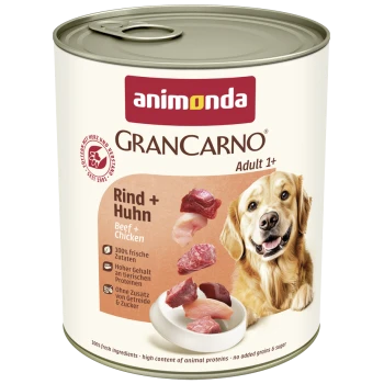 Puszka karmy dla psa Animonda GranCarno Adult 1+ z wołowiną i kurczakiem, z wesołym golden retrieverem i tekstem w języku niemieckim i angielskim.