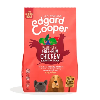 Dog food bag from Edgard Cooper for senior dogs, labeled "Magnificent Free-Run Chicken & Norwegian Salmon," grain-free with fruit illustrations.