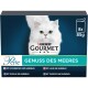 Purina Gourmet Katzenfutterbox mit einer weißen Katze, beschriftet mit "Perle Genuss des Meeres," die 8 Packungen à 85g mit Meeresfrüchteoptionen enthält.