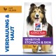 Hill's Science Plan Hundefutter für empfindlichen Magen und Haut mit Huhn, auf der Verpackung ein glücklicher Shetland Sheepdog.