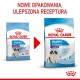 Dwie torby karmy dla szczeniąt Royal Canin oznaczone "PUPPY GIANT" i "PUPPY 2-8 months," z czerwonym banerem "NOWE OPAKOWANIA, ULEPSZONA RECEPTURA."