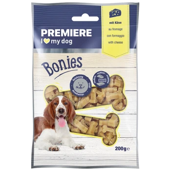 PREMIERE I love my dog Bonies Hundesnacks mit Käse, mittlere Größe, 200g, knochenförmige Leckerlis auf Holzuntergrund.