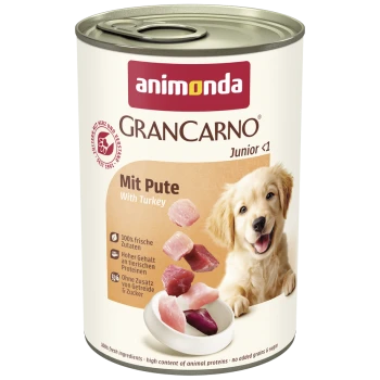 Dose Animonda GranCarno Junior Hundefutter mit Truthahn, zeigt frische Fleischstücke und einen Hund auf dem Etikett.