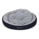 Rundes, plüschiges Haustierbett in Grau und Marineblau, mit gepolstertem Kissen und dem Logo "Doctor Bark" an der Seite.