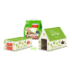 Image des produits Cat's Best présentant un sac vert de litière pour chat, une boîte étiquetée "Home Sweet Home" et une maison en carton.