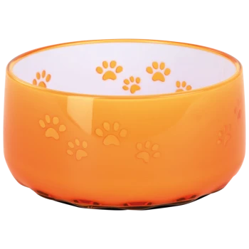 Orange pet food bowl with paw print designs on the exterior and interior, featuring a glossy finish.