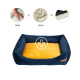 Ein plüschiges Haustierbett mit navyblauem Außenmaterial und gelbem Innenfutter, mit einer 4 cm dicken Schaumstoffbasis, illustriert mit Handabdrücken und einem Pluszeichen.