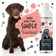 Ein verspielter brauner Hund sitzt neben einer Flasche "Bugalugs No Rinse Papaya & Coconut Shampoo + Conditioner" und bewirbt eine einfache Waschzeit.