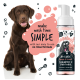 Ein verspielter brauner Hund sitzt neben einer Flasche "Bugalugs No Rinse Papaya & Coconut Shampoo + Conditioner" und bewirbt eine einfache Waschzeit.