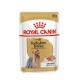 Royal Canin Adult Yorkshire Terrier Hundefutterbeutel, 85g, mit einem Bild eines Yorkshire Terriers, das die Fellgesundheit betont.