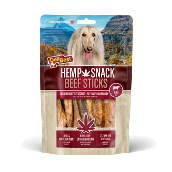 Packung DeliBest Hemp Snack Beef Sticks Hundesnacks mit Bild eines langhaarigen Hundes, Hanfblatt und der Aufschrift 'Made in Switzerland'.