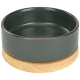 Eine dunkelgraue keramische Futterschüssel für Haustiere mit einem Holzsockel, die ein glattes Innere und einen subtilen metallischen Rand aufweist.