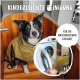 Ein schwarz-weißer Hund, der ein grünes Handtuch trägt, sitzt in einer Holzbadewanne. Der Text lautet "Kinderleichte Reinigung" und "Für die Waschmaschine geeignet."