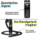 Schwarze Hundetraining Pfeife mit einem Bärenlogo, mit Text über ein konstantes Signal bei 5900 Hz und einer 45 cm langen Leine, die 5 g wiegt.