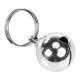 Silver pet bell on a keyring, featuring a small opening for sound, ideal for attaching to collars or harnesses.