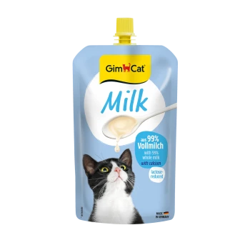 GimCat Milk pouch, yellow cap, spoon dripping milk above tuxedo cat; labels: GimCat, Milk, 99% Vollmilch, lactose-reduced