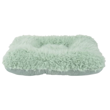 Lit pour animaux de compagnie doux de couleur vert menthe avec une texture duveteuse et une surface en peluche, conçu pour le confort et la détente.