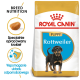 Torba z jedzeniem Royal Canin dla szczeniąt rasy Rottweiler z obrazkiem szczeniaka Rottweilera, z tekstem podkreślającym odżywianie rasy i wsparcie odporności.