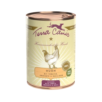 Eine Dose Terra Canis Hundefutter mit einer Hühnerillustration, beschriftet mit "Huhn mit Tomaten, Amaranth & Basilikum" und "Chicken with Tomato."