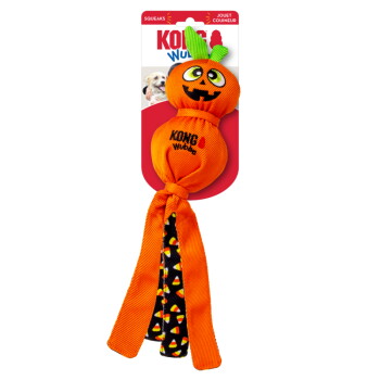 KONG Wubba orange Halloween pumpkin dog toy with jack-o'-lantern face, green top, long tails with candy-corn print
