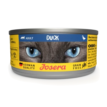 Acht Dosen Josera Katzenfutter mit der Aufschrift "Ente," die eine Nahaufnahme einer blauäugigen Katze zeigt, mit hervorgehobenen "Getreidefrei" und "Deutsche Qualität."