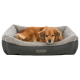 Ein gemütliches Hundebett mit einem weichen grauen Innenraum und einem dunkelgrauen Außenbereich, mit einem ruhenden Golden Retriever.