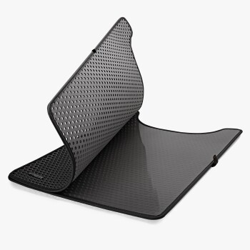 Schwarze Hundetrainingmatte mit einer strukturierten Oberfläche, teilweise aufgerollt, die ihr perforiertes Design für Atmungsaktivität zeigt.