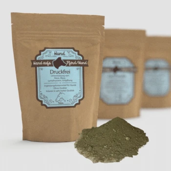 Braune Papiertüte mit der Bezeichnung 'Druckfrei' für Hundesupplemente, mit blauer Schrift, die Unterstützung für Nieren, Blase und Entgiftung beschreibt.