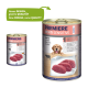 Dosenhundefutter "Premiere Meati Sensitive" mit einem Golden Retriever, rohen Rindfleischscheiben und einer kleineren Dose. Neues Design, gleiche Qualität.