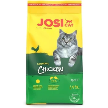 Katzenfutterbeutel mit einer grauen Katze auf einem gelb-grünen Hintergrund, beschriftet mit "JOSI CAT Crunchy Chicken", 1,9 kg, 78% tierisches Protein.