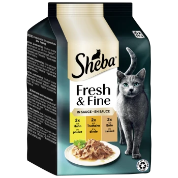 Emballage de nourriture pour chats Sheba Fresh & Fine présentant une assiette de viande dans une sauce, avec des saveurs : poulet, dinde et canard.