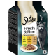 Emballage de nourriture pour chats Sheba Fresh & Fine présentant une assiette de viande dans une sauce, avec des saveurs : poulet, dinde et canard.