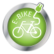 Grünes kreisförmiges Symbol mit einer weißen Umrisszeichnung eines Fahrrads mit einem Stecker, mit der Aufschrift "E-BIKE" oben.