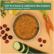 Schüssel mit orangefarbenem Tierfutter mit frischen Karotten, Cranberries und Zucchini, mit dem Text: '100% frische & natürliche Bio-Zutaten.'