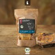 LIEBESGUT Kraft-Tüte mit Bio-Rind Hundesnacks beschriftet 'BIO-RIND GAUMENHAUT' und 'SNACK FÜR HUNDE' mit BIO-Siegel.