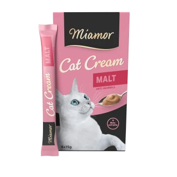 Crème pour chat Miamor dans une boîte rose, présentant un chat blanc regardant vers le haut, étiquetée 'MALT' et 'ANTI-HAIRBALL', avec une cuillère de crème.