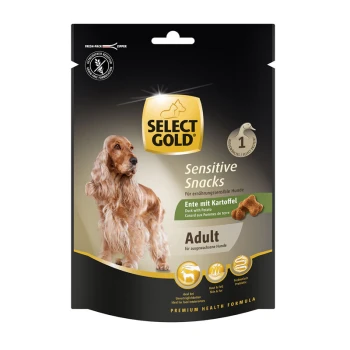 Sélectionnez des collations sensibles en or pour chiens, avec un golden retriever sur le devant, mettant en avant le texte "Canard avec Pomme de Terre" et "Adulte."