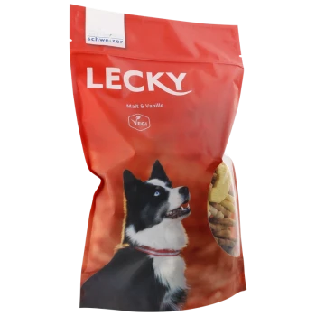 Rote Tüte mit LECKY Hundeleckerlis, die einen schwarz-weißen Hund mit blauen Augen zeigt, beschriftet mit "Malt & Vanille" und als "VEGI" gekennzeichnet.