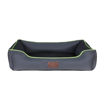 Rectangular gray pet bed with raised bolsters, lime-green trim and leather label reading "Beddies".